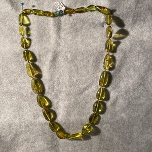 26” long Green amber (grade A) made in Lithuanian with fossilized pieces